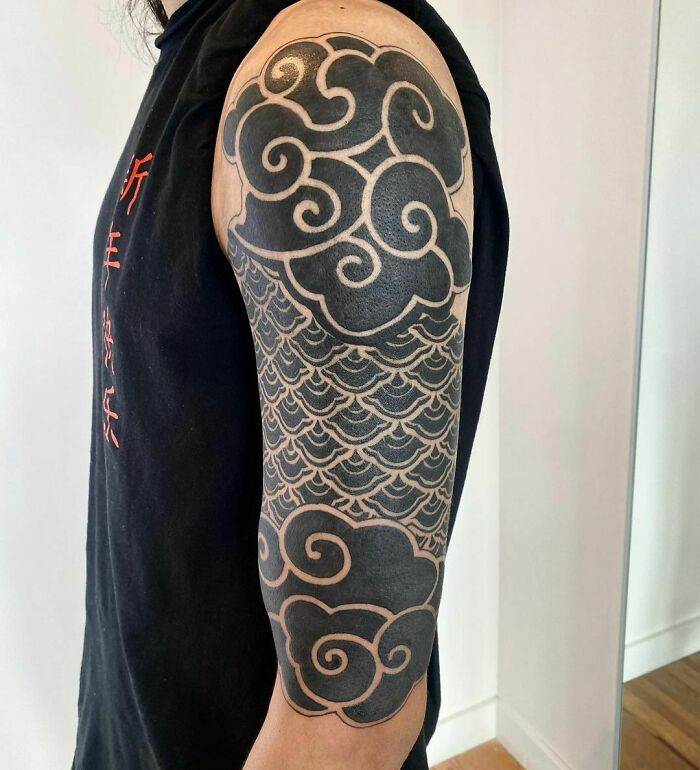 Black geometric left arm half sleeve tattoo