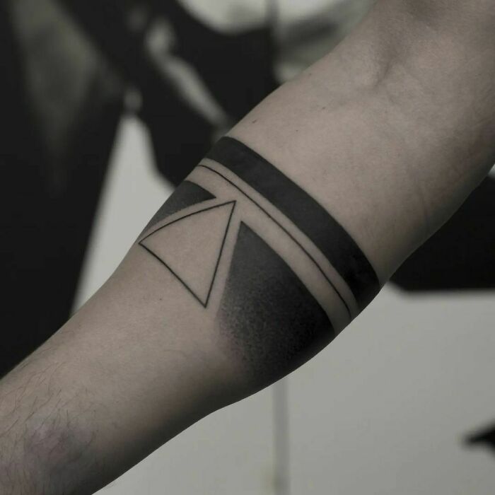 Geometric black tattoo on arm