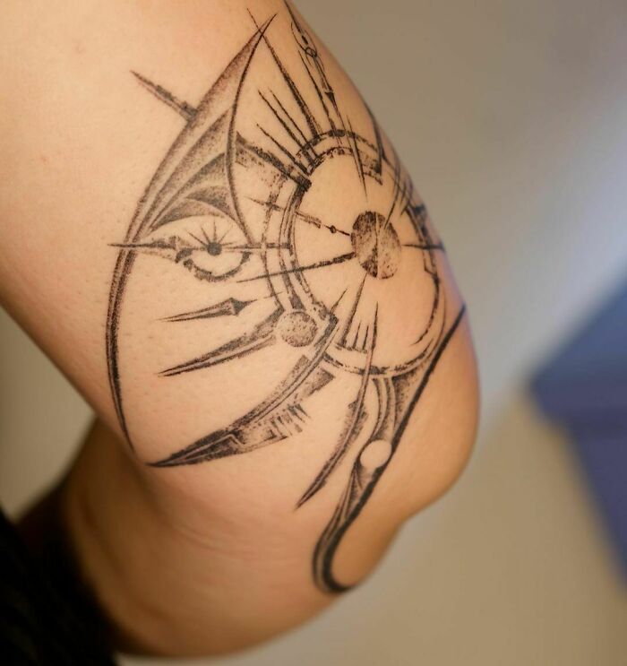 Abstract geometric tattoo on leg