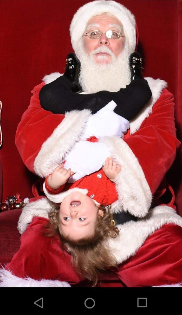 The Look On Santa's Face Says It All. My Niece At The Mall On Christmas