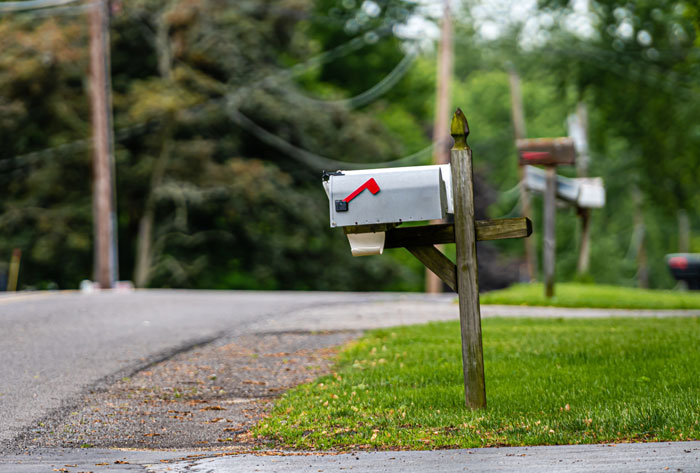 Hanging out kid picks up mailbox to face after trying to run neighbor's dog on ATV