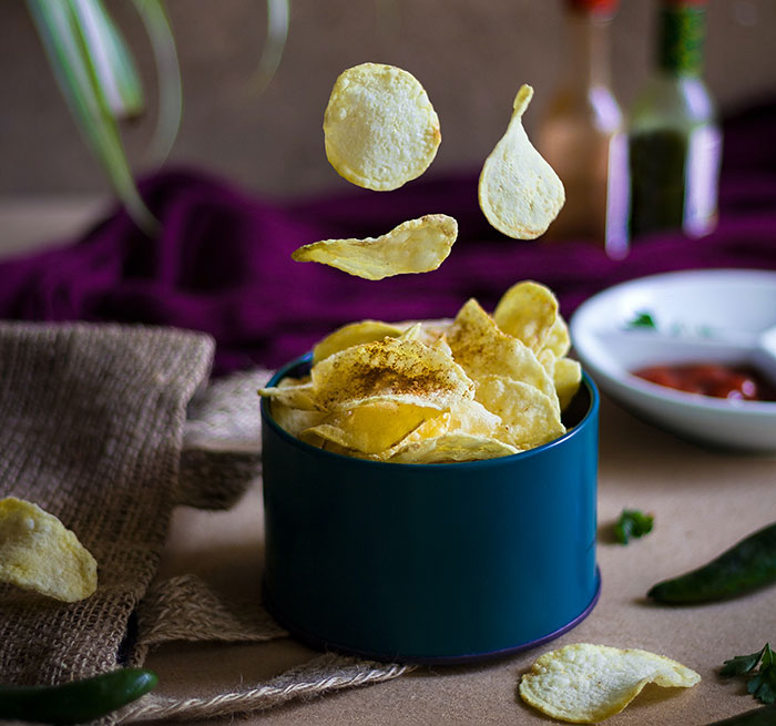 Potato chips in a blue bowl 