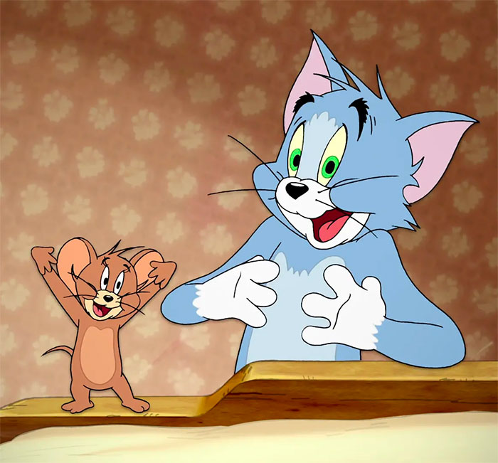 Tom and Jerry smiling 