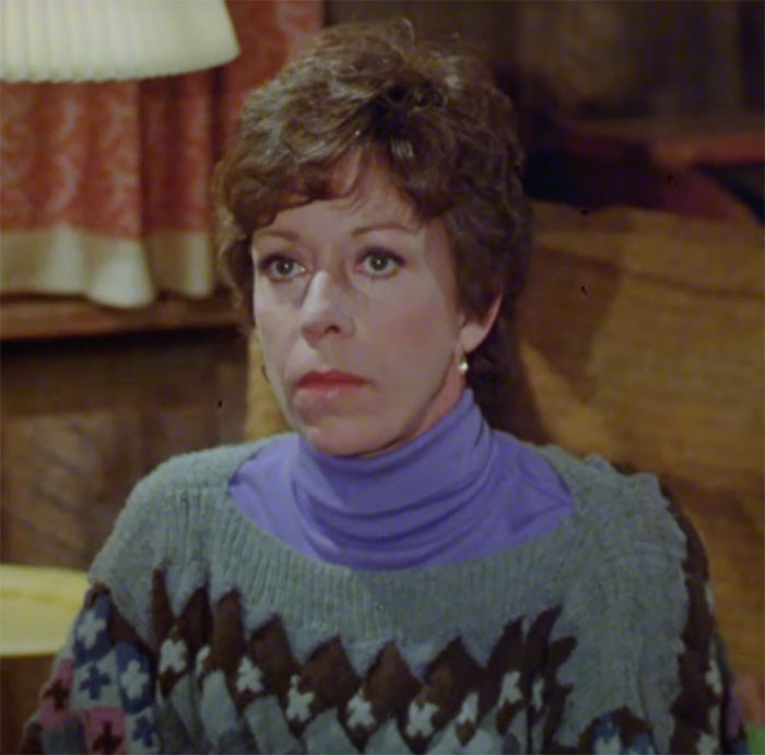Carol Burnett sitting and looking in movie The Four Seasons