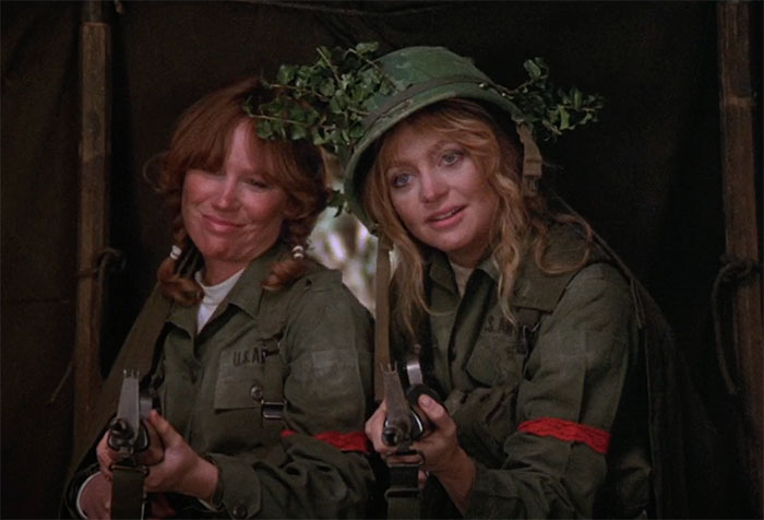 Goldie Hawn and Eileen Brennan wearing military clothes