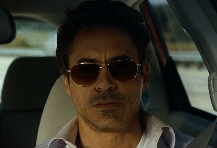Robert Downey Jr. driving a car in movie Due Date