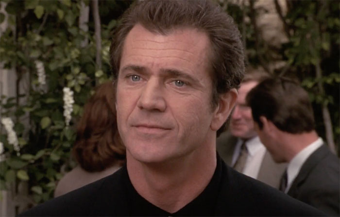 Mel Gibson looking and smiling in movie What Women Want 