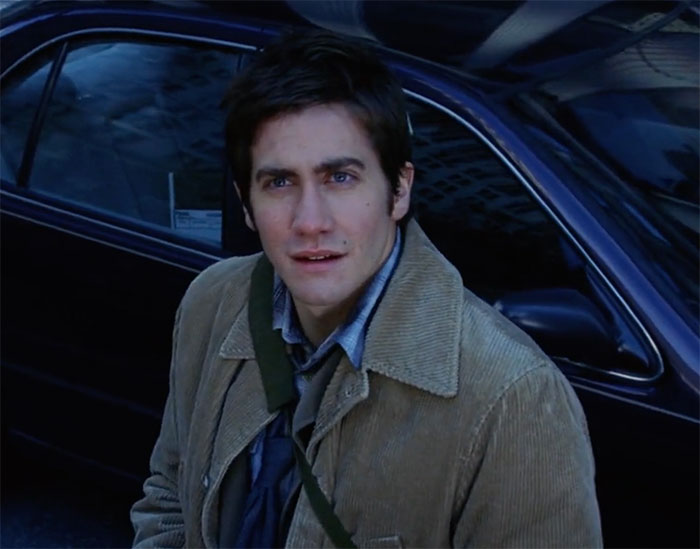 Jake Gyllenhaal standing and looking in movie The Day After Tomorrow
