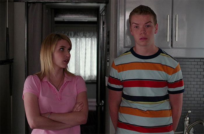 Emma Roberts and Will Poulter standing in movie We’re The Millers