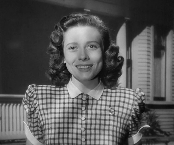 Myrna Loy smiling in movie The Best Years of Our Lives