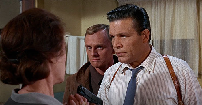 Neville Brand holding gun in movie That Darn Cat!