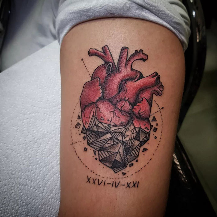 Geometric red heart tattoo