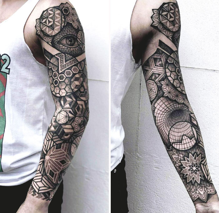 Geometric with eye arm sleeve tattoo 