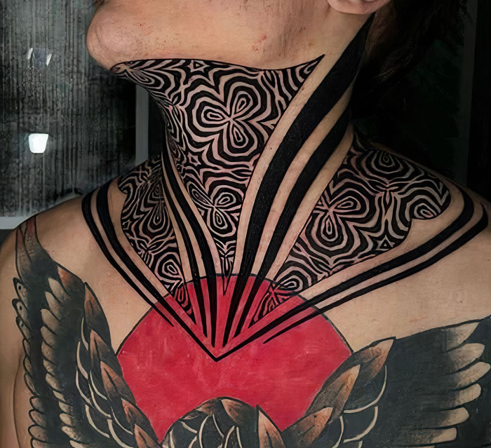 Geometric tattoo design with intricate shapes on neck and chest, showcasing creativity and bold forms.