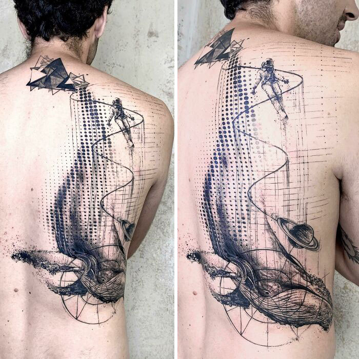 A geometric tattoo design on a man's back featuring an astronaut and abstract elements.