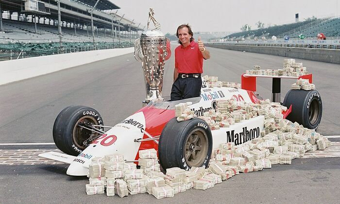 Your Tinder Picture Might Never Look As Good As Emerson Fittipaldi Did Posing With $1 Million In Cash After Winning The ’89 Indy 500