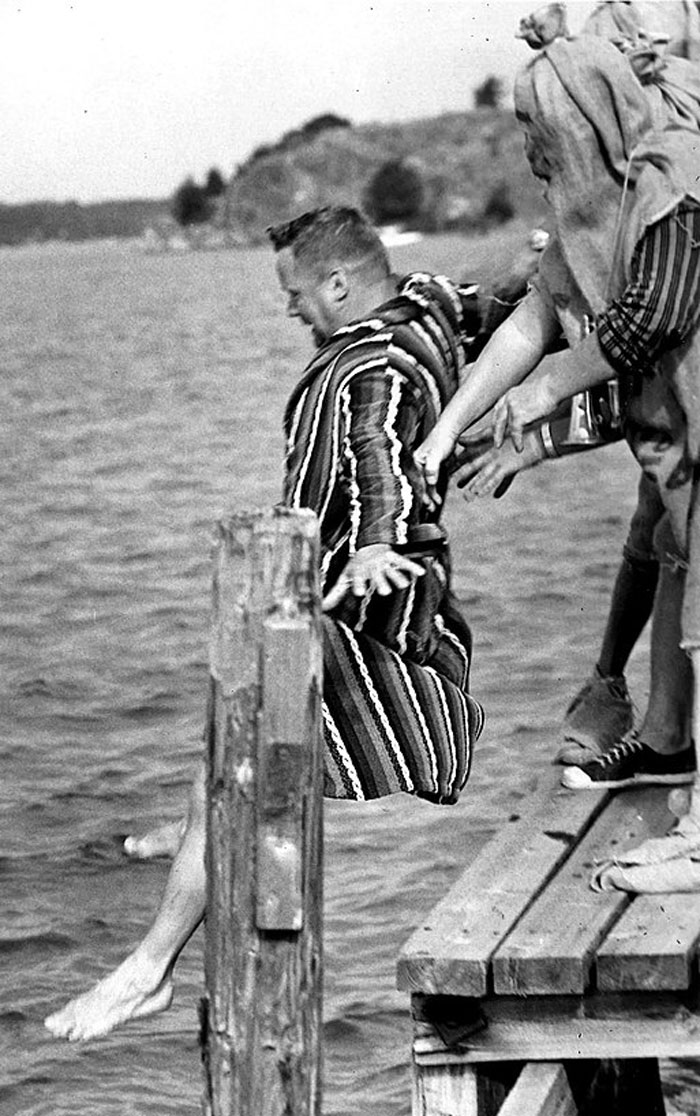 A man getting thrown into the water at The National Sleepy Head Day in 1967