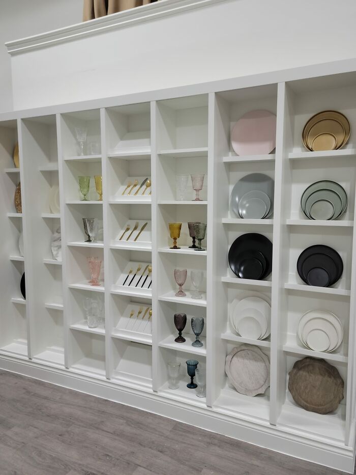 Showroom Display Unit. Billy Bookcase With Mosslanda Picture Shelves To Hold Plates. Angled Shelves And Trim Work