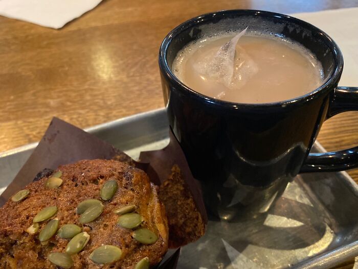 Tea And Morning Glory Muffin In Cafe