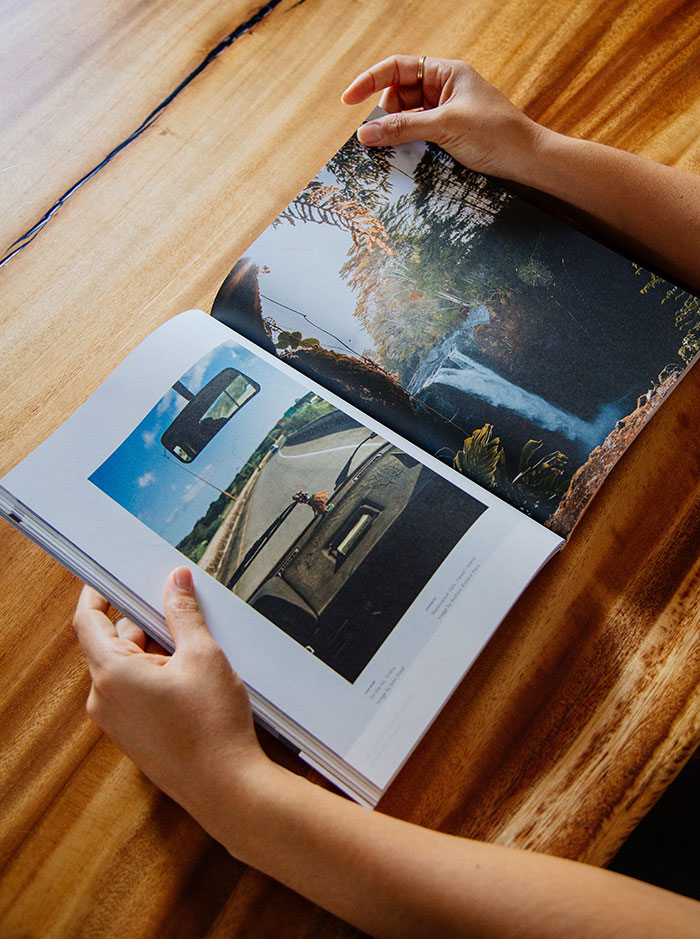 Person holding magazine