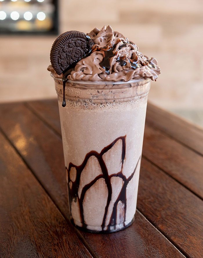 Picture of brown milkshake with oreo