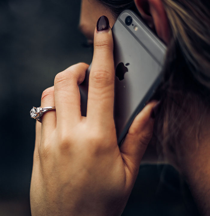 Person speaks on the phone