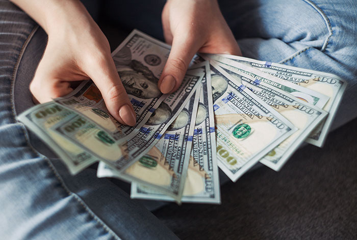 Person holding money