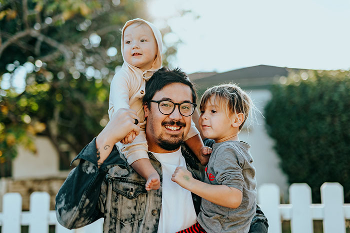 Father with kids smiling