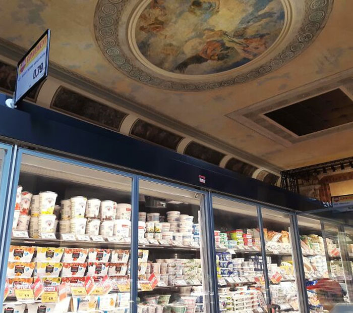 Old Theatre Turned Into A Supermarket, The Walls Are Still Covered In Art (Venice)