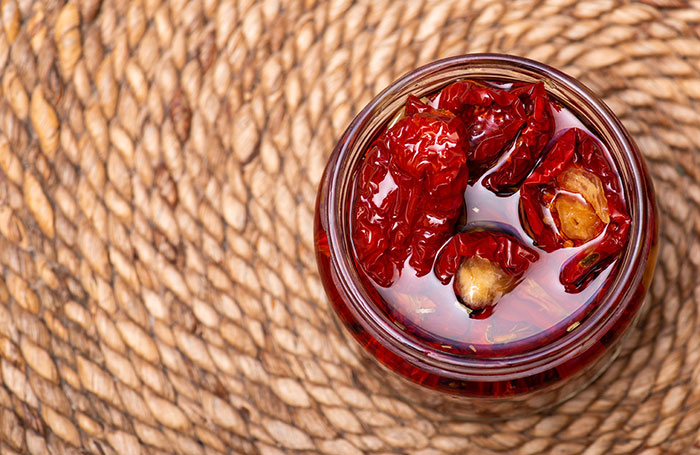 A jar of sun-dried tomatoes