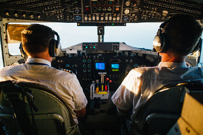 Two pilots in airplane