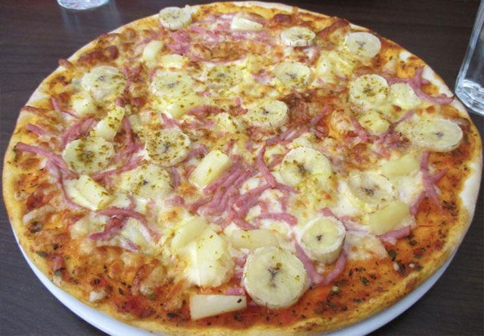 Pizza with banana on top