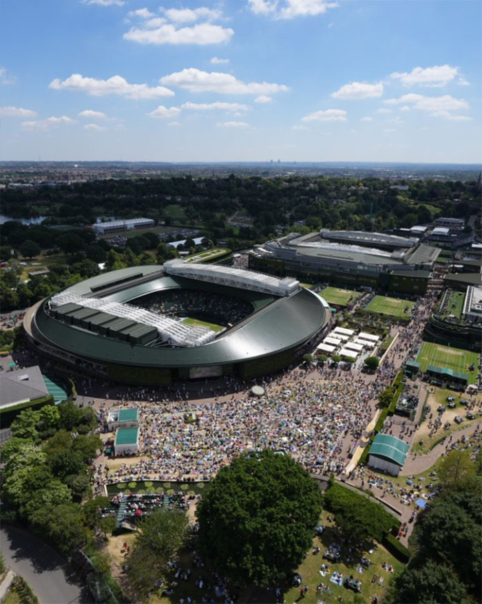 Aerial view of stadium with full of people at daytime
