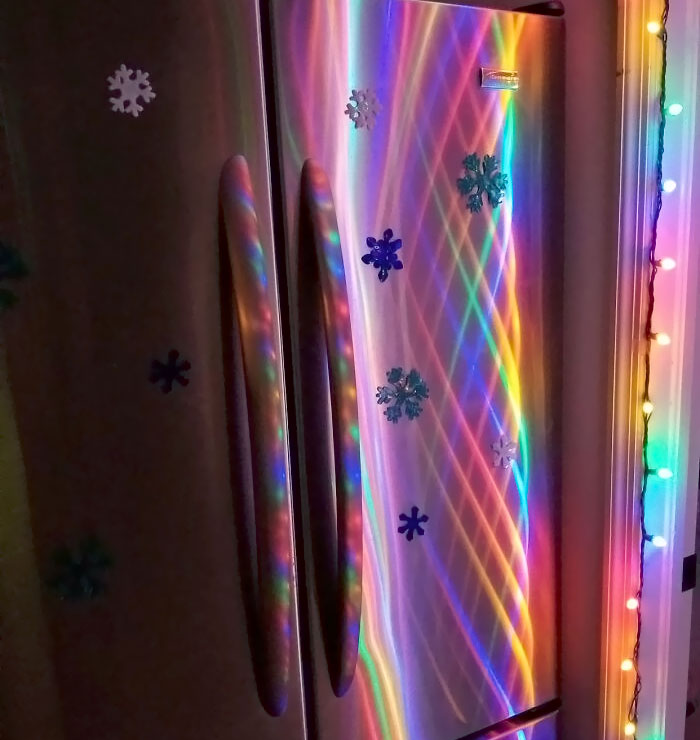 Christmas Lights Reflection On Fridge