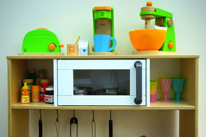 toy microwave and other kitchenware
