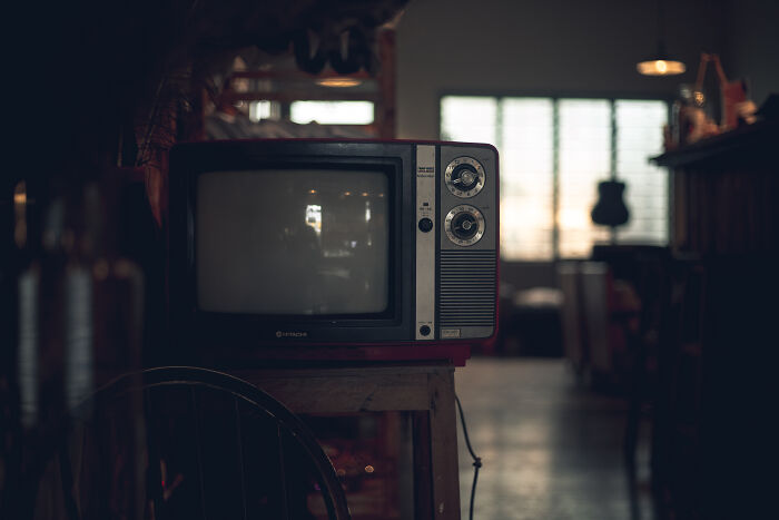 an old TV set on the chair