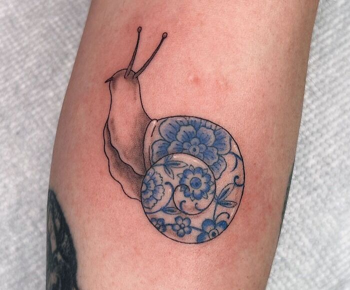 Porcelain Snail Tattoo