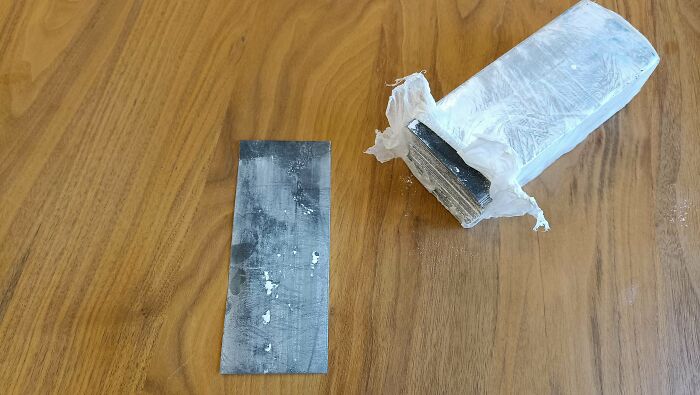 Found In A Safe In A Deceased Man's House: 11 Identical Stacks Of Thin Black Paper Strips, Wrapped In Plastic Foil, Covered In Fine White Dust. Measurements Of Each Strip Approximately 16 Cm X 6,5 Cm, Height Of Each Stack Approximately 5 Cm. Other Than That, The Safe Was Empty