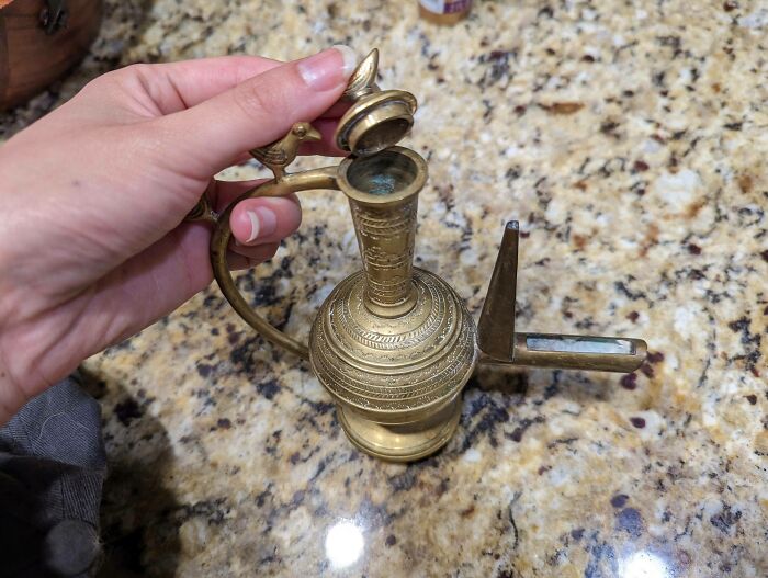 What's This Heavy, Brass, Genie Lamp-Like Object With Both A Weird Cutout Spout And A Narrow Upwards Spout?