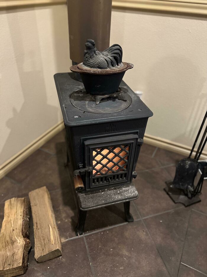 What Is This Rooster Basin Looking Things On The Wood Stove Used For?