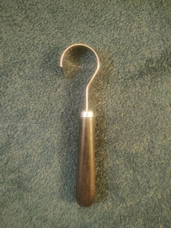 Strange Looking Hook Thing Found Buried In A Hutch. The Inscription On The Hook Side Is In French. Any Ideas?
