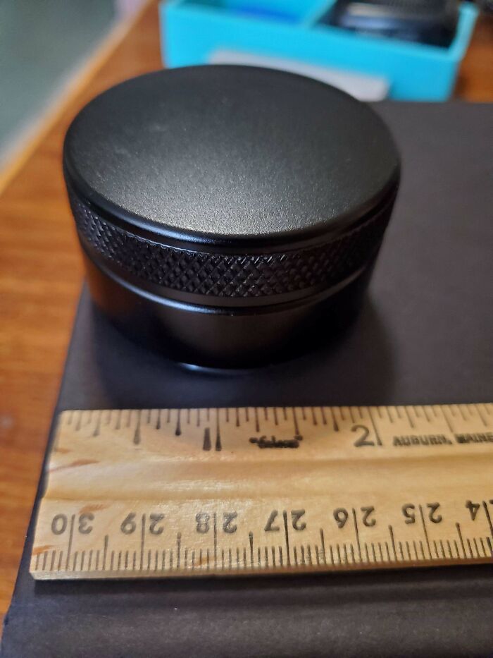 A Black Metal Puck With A Silver Tri-Point Pattern On One Side; Unscrews Into 3 Pieces. About 2in/5cm Wide, 1.5in/4cm Tall, Weighs About 13oz. Listed As "Mystery Item" At A Public Auction In Southern California
