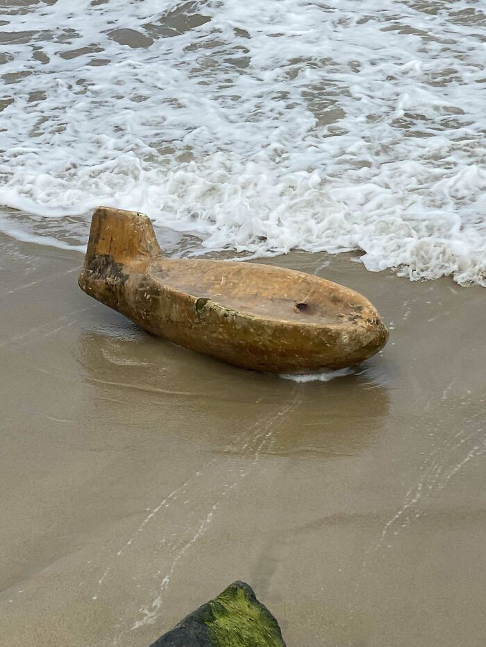 This Washed Up On The Beach. Is Very Heavy But Seems To Barely Float. It Is About The 3-4 Feet Long And Looks Like Fiber Glass On The Outside But Not Completely Sure