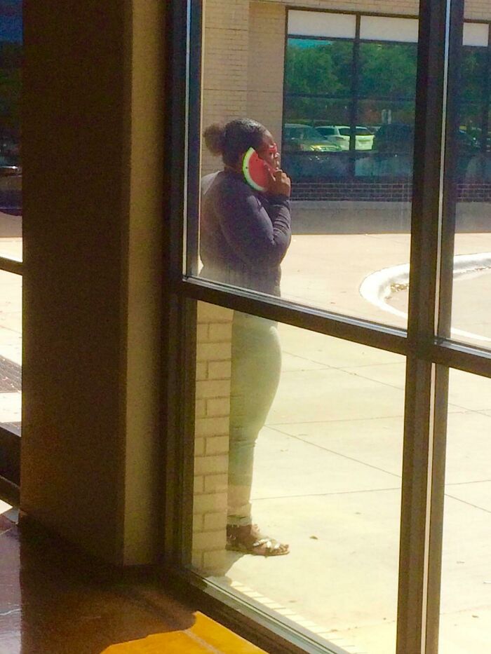 This Lady's Cell Phone Case Makes It Look Like She's Talking On A Slice Of Watermelon