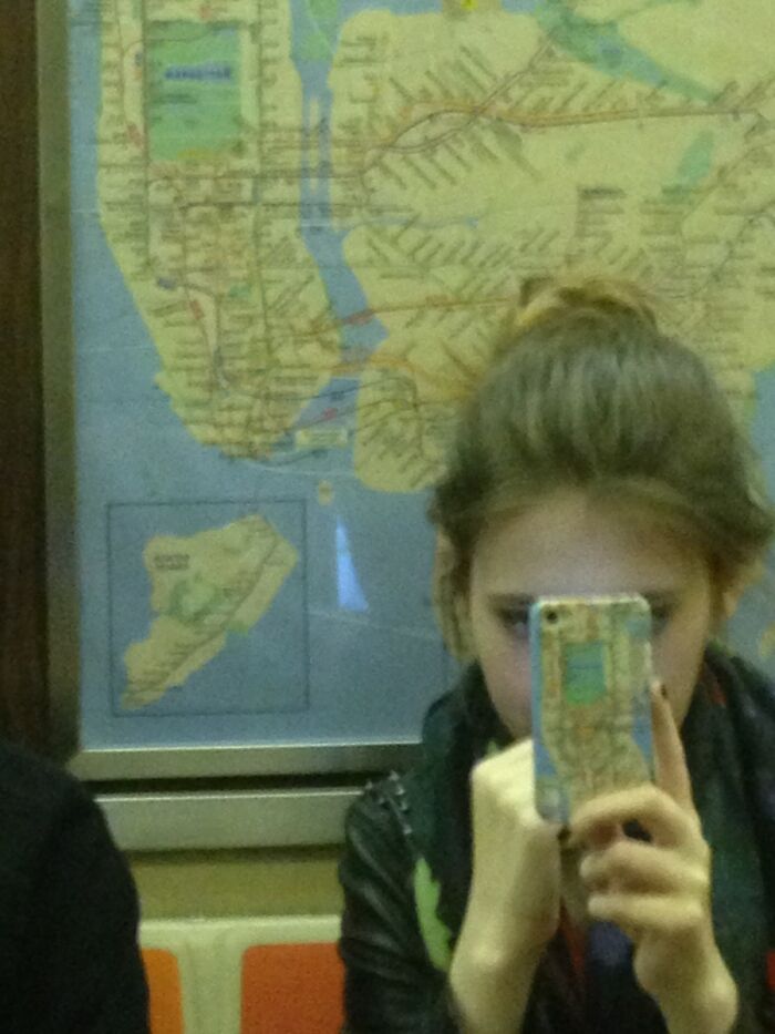 This Girl's Phone Case Matched The Map Behind Her