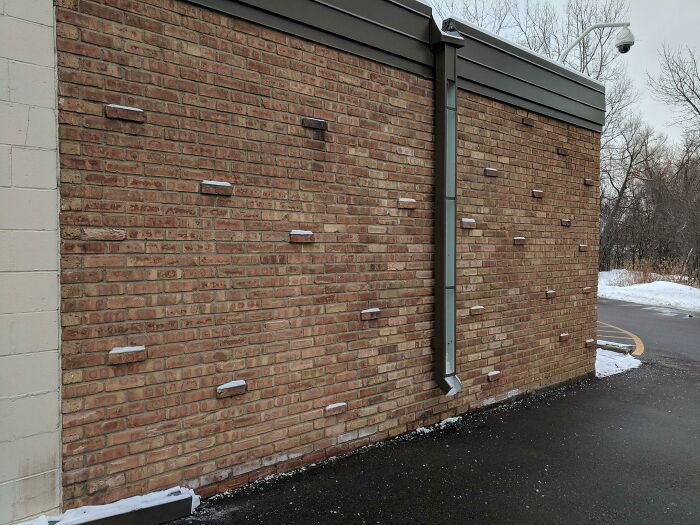 The Snow On These Bricks Makes Them Look Like Climbing Points In A Video Game