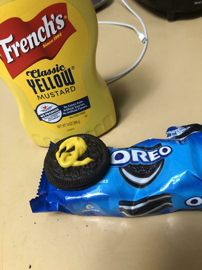 Oreo cookie with mustard on top