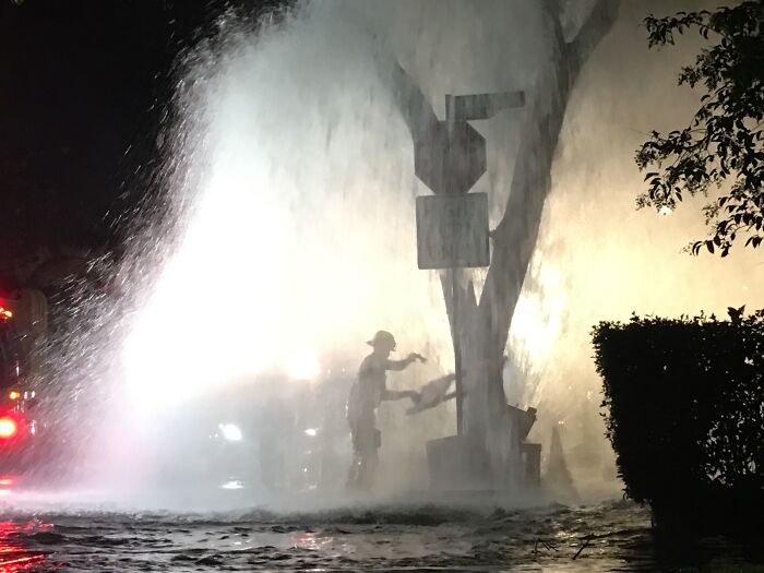 Someone Crashed Into A Fire Hydrant Outside My Apartment In LA And This Firefighter Stood Directly In The Stream For 30 Min In The 40 Degree Weather To Turn It Off