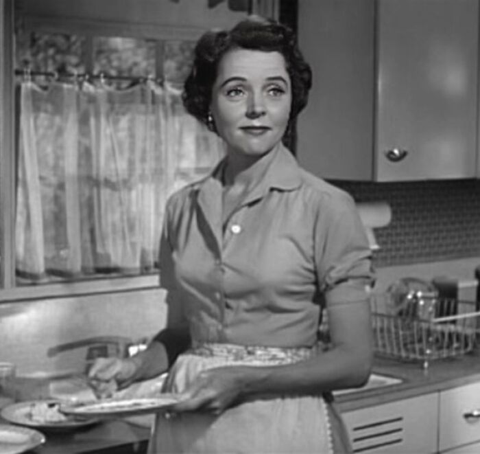 Margaret Anderson doing dishes in a kitchen