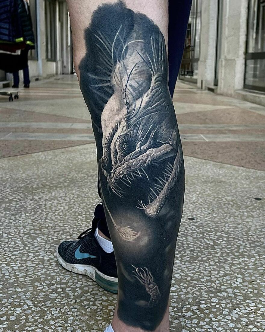 Deep sea anglerfish tattoo on leg